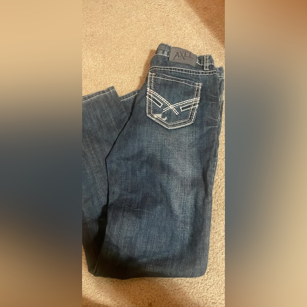 Young men’s Boot cut jeans.  Worn once for family pictures. Size 20